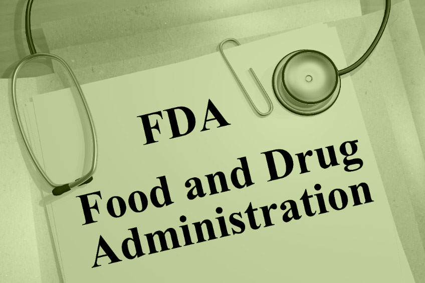 En gröntonad bild av dokument som visar informationen "FDA - Food and Drug Administration" med ett stetoskop.